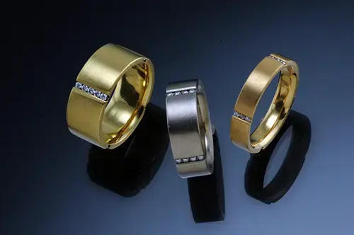 14K White Gold, 18K Yellow Gold with channel set Diamonds